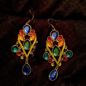 Like new. Multicolor stones. Surprisingly light.